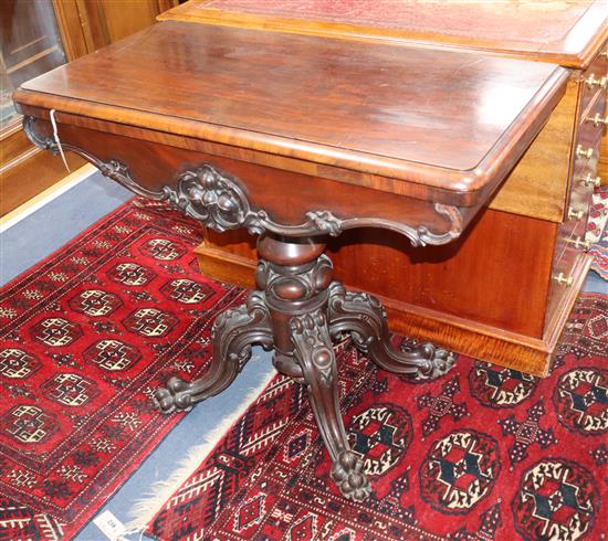 A Victorian mahogany folding card table W.90cm